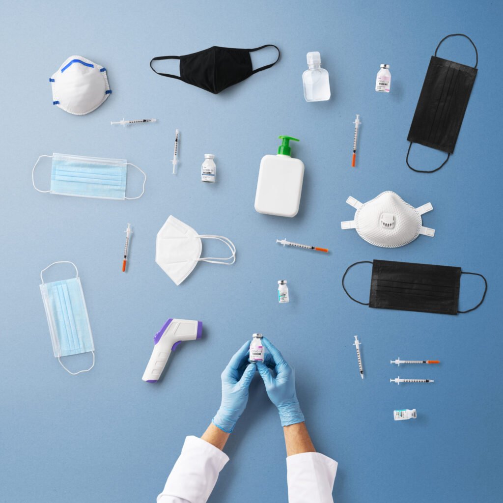 hand with syringe injection, covid 19 and vaccination concept.